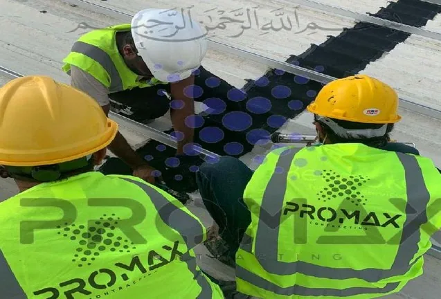 ETCE team installing EPDM waterproofing on a metal roof in Dammam KSA